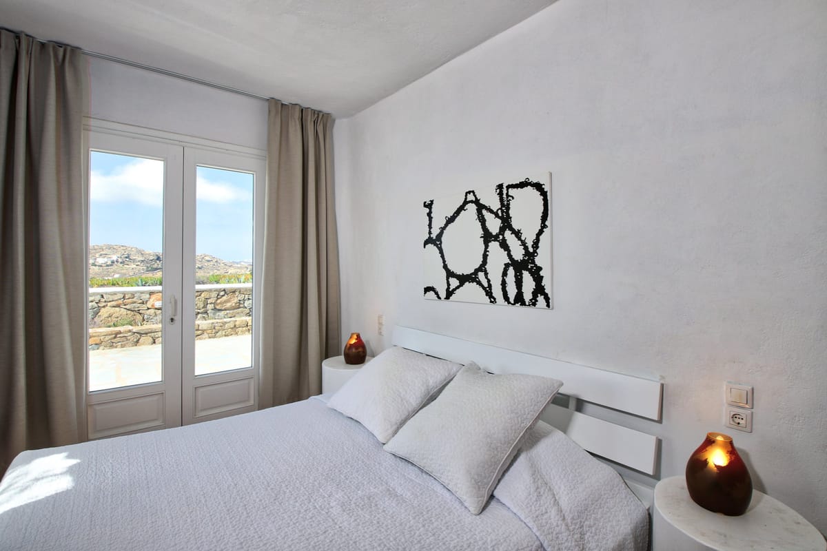 A bedroom opening onto the terrace