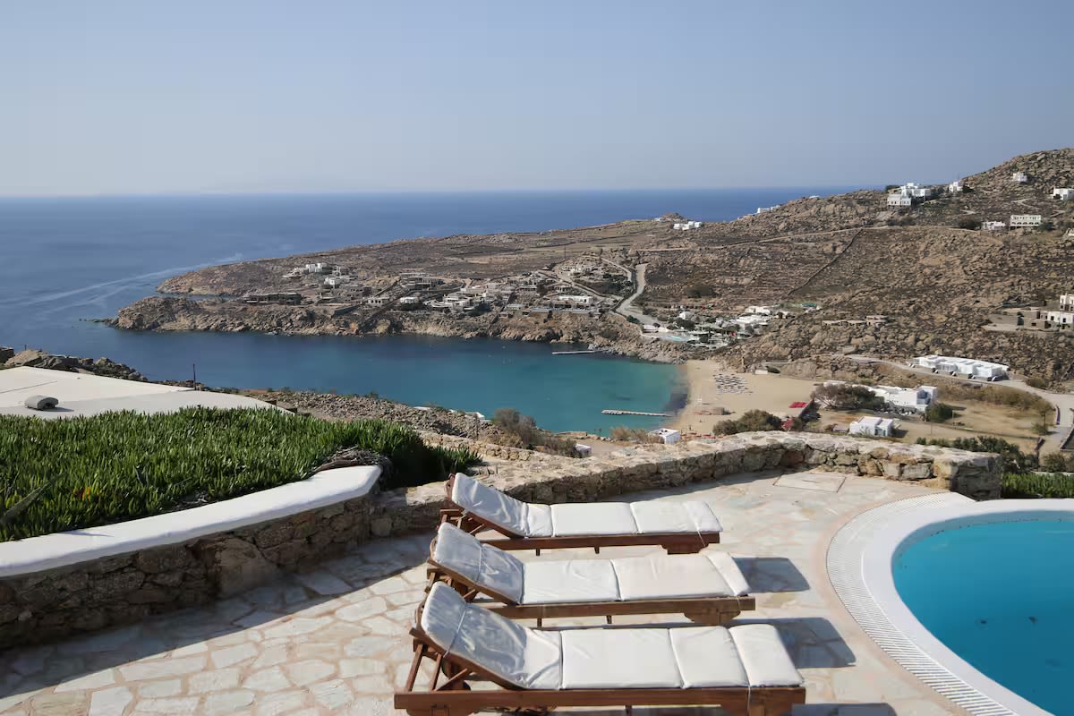 The pool terrace, looking down over the bay